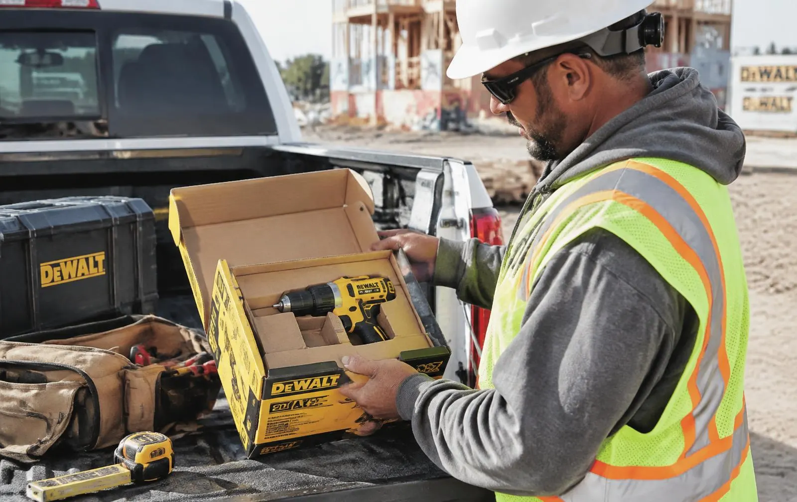 Brand-new DEWALT tools from a liquidation pallet, ready for resale. DEWALT tools on a jobsite